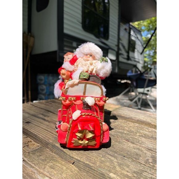 Santa Claus his helpers toys in a car￼ - Picture 2 of 16